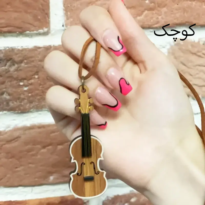 گردنبند دخترانه و پسزانه طرح ویولن با ابعاد کوچک دست مدل