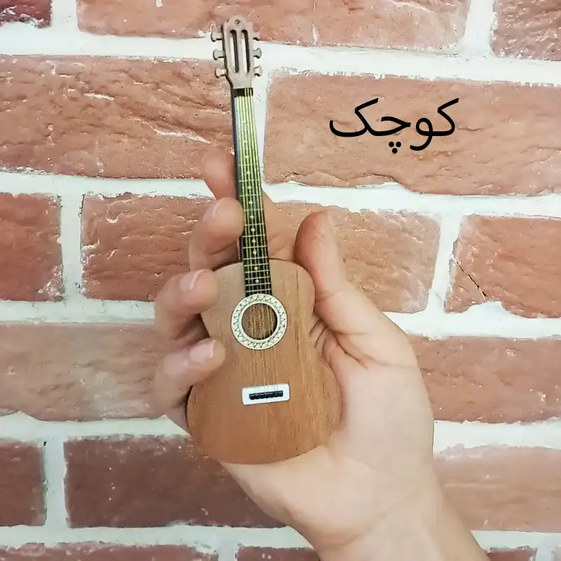 ماکت دکوری طرح گیتار کوچک دست مدل