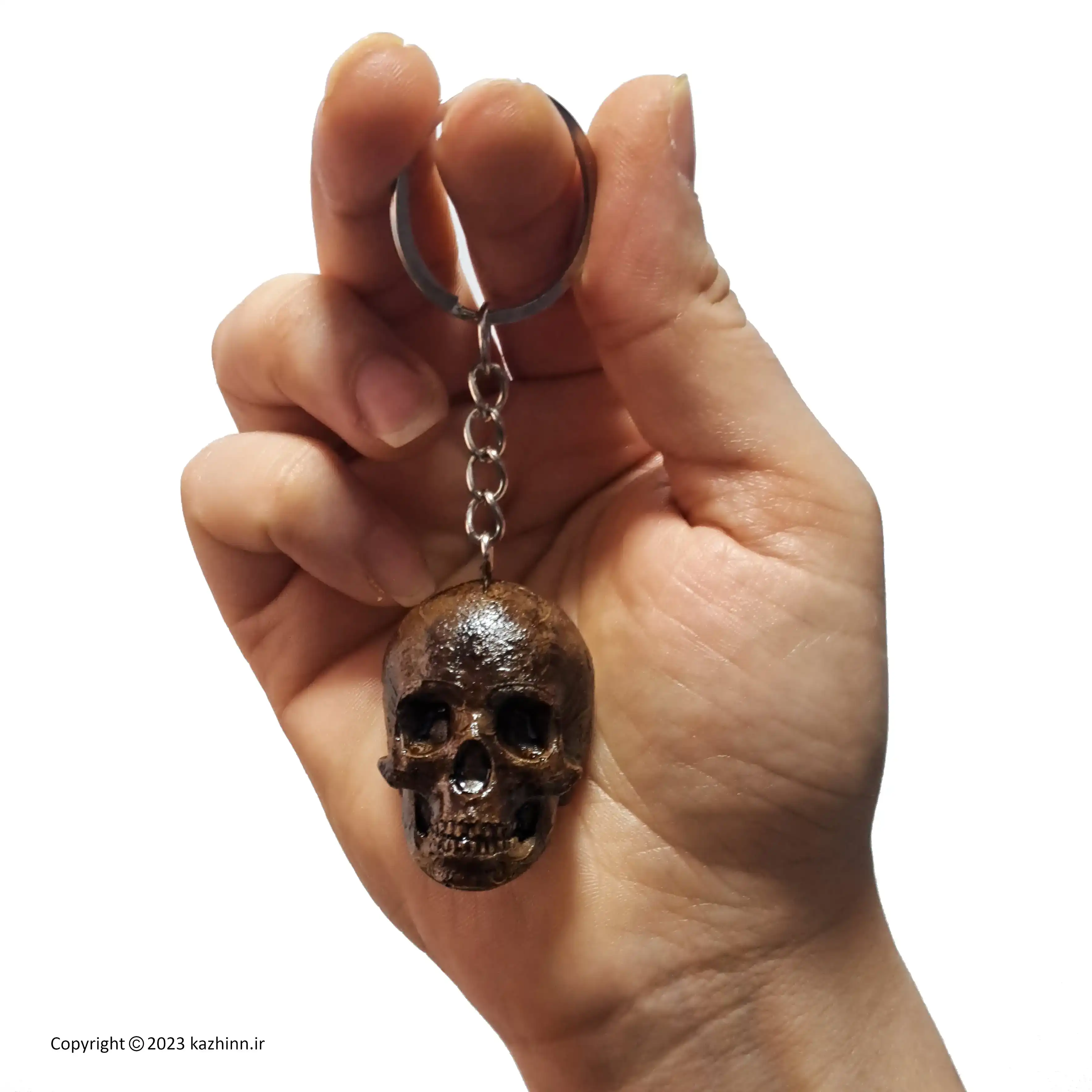 جاکلیدی اسکلتی طرح چوب کد p4119: یک اکسسوری خفن و خاص طرح چوب که از اسکلت جمجه انسان الگو برداری شده و در این فروشگاه میتوانید جا کلیدی طرح اسکلت را با قیمت مناسب بصورت تک و عمده خرید نمایید. هدیه مناسب برای دوستداران طرح اسکلت و علاقهمندان به سبک های گنگ و دارک امکان ست کردن با انواع اکسسوری طرح اسکلت و لوازم و وسایل گنگ