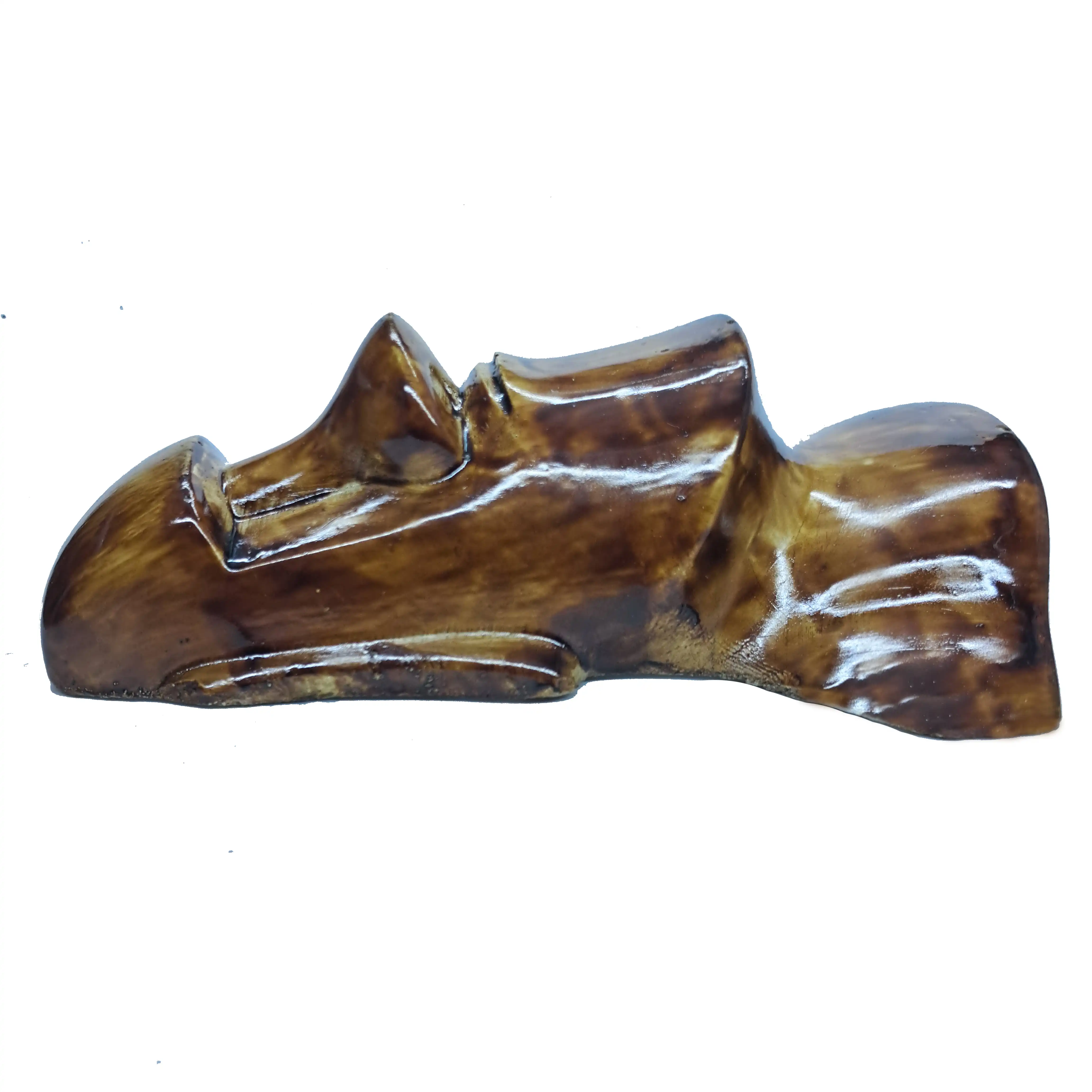 دیوارکوب مدل ایستر کاکا سنگی طرح چوب ابروبادی کد p3112: ضمانت کیفیت | ارسال فوری | ارسال ۱ ساعته شهر تهران | تک و عمده دیوارکوب مدل مجسمه ایستر کاکاسنگی کد p3112: یک مجسمه دیواری خاص که طرح چوب ابروبادی بوده و از مجسمه های جزیره ایستر الگو برداری شده است، که در این فروشگاه میتوانید با قیمت مناسب بصورت تک و عمده خرید نمایید. در پشت این مجسمه حفره ای وجود دارد و به راحتی قابل وصل کردن به دیوار است. این مجسمه مناسب دکوری، دیوارکوب یا دیواری و … بوده و رنگ آن ثابت می باشد. امکان ست کردن با انواع طرح کاکا سنگی