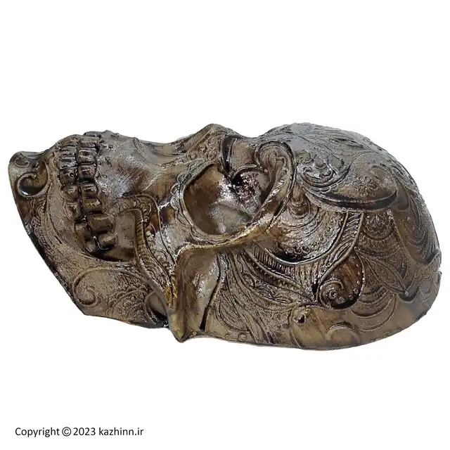 دیوارکوب اسکلتی طرح چوب کد p3115: یک مجسمه دیواری خاص که طرح چوب بوده و از اسکلت جمجمه انسان الگو برداری شده است، در این فروشگاه میتوانید با قیمت مناسب بصورت تک و عمده این دیواری شیک و خاص را خرید نمایید. در پشت این مجسمه حفره ای وجود دارد و به راحتی قابل وصل کردن به دیوار است. مناسب دکوری، دیوارکوب یا دیواری و … بوده و رنگ آن ثابت می باشد. یک هدیه شیک و خاص مناسب دوستداران طرح اسکلت و علاقه مندان به سبک های گنگ و دارک امکان ست کردن با انواع طرح اسکلت
