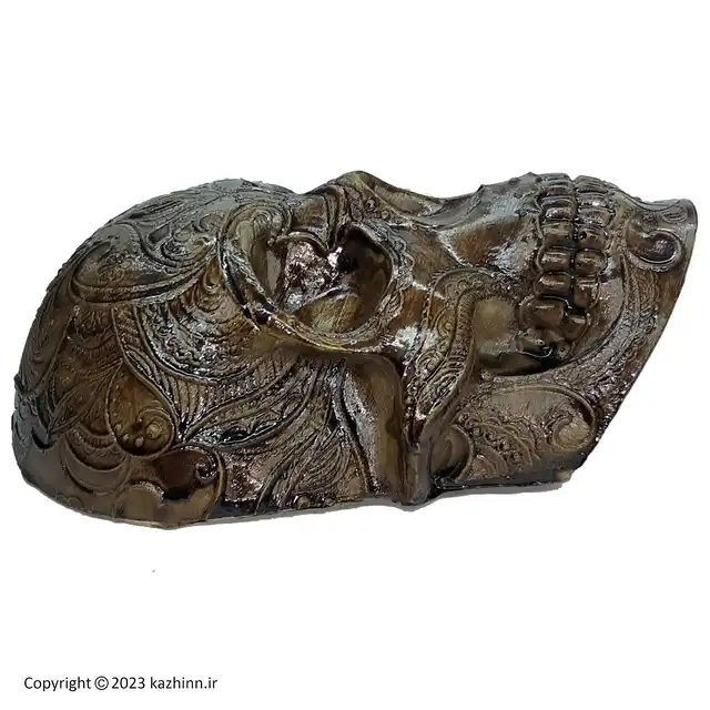دیوارکوب اسکلتی طرح چوب کد p3115: یک مجسمه دیواری خاص که طرح چوب بوده و از اسکلت جمجمه انسان الگو برداری شده است، در این فروشگاه میتوانید با قیمت مناسب بصورت تک و عمده این دیواری شیک و خاص را خرید نمایید. در پشت این مجسمه حفره ای وجود دارد و به راحتی قابل وصل کردن به دیوار است. مناسب دکوری، دیوارکوب یا دیواری و … بوده و رنگ آن ثابت می باشد. یک هدیه شیک و خاص مناسب دوستداران طرح اسکلت و علاقه مندان به سبک های گنگ و دارک امکان ست کردن با انواع طرح اسکلت