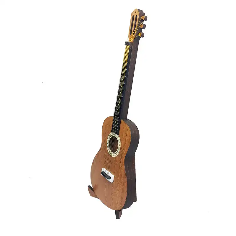 ماکت دکوری (عکس از نیم رخ) طرح گیتار مدل کوچک کد m25145 | چوبی | ضمانت کیفیت | ارسال فوری | جزئیات دقیق | قیمت و خرید انواع دکوری و ماکت مینیاتوری | تک و عمده | کاژین